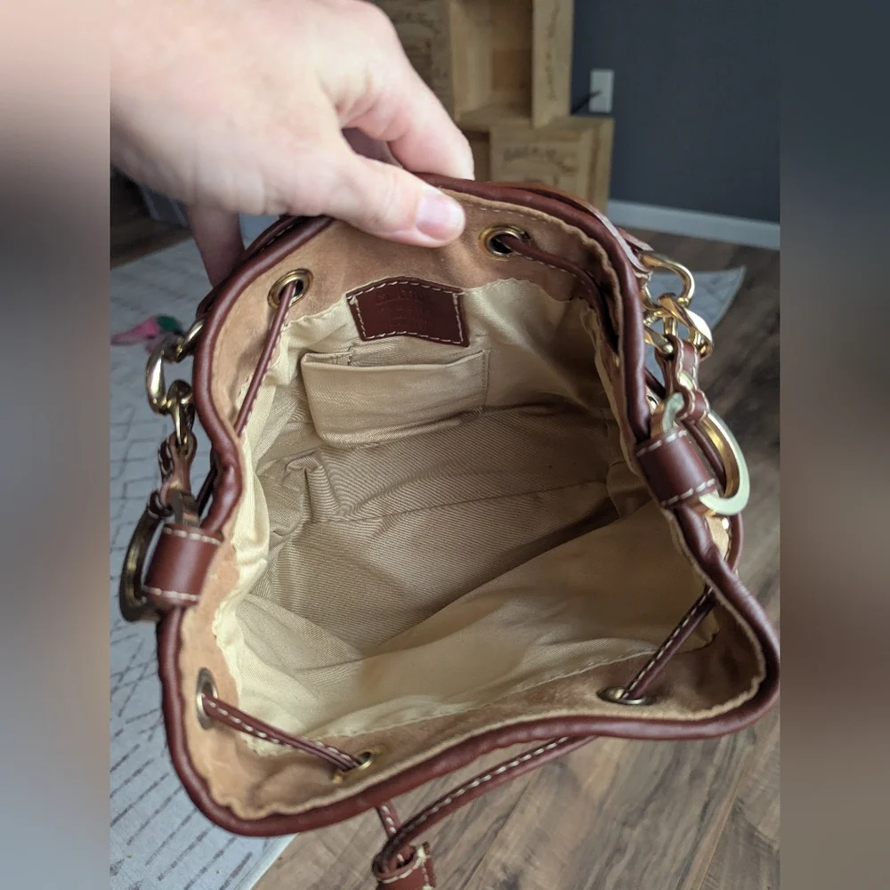 Claudia Firenze Leather Bucket Bag With Pull Top And Tassels.